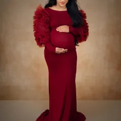 I love the softness of maternity shoots. Here, I used gentle, natural makeup to enhance her beautiful pregnancy glow, creating a timeless and serene portrait she can cherish forever.