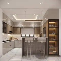 Here is a perfect example of a modern, open-concept kitchen. We designed this U-shaped layout with a breakfast counter, combining glossy beige and wood-finish cabinets with a sleek black countertop and integrated appliances for a seamless look.