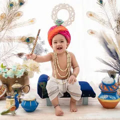 Nand ke anand bhayo. This little Krishna is full of energy and smiles, ready to celebrate Janmashtami in our beautiful studio setup.