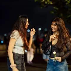 Laughter captured under the city lights. This photo shows the genuine, happy moments I strive to capture during my sessions.