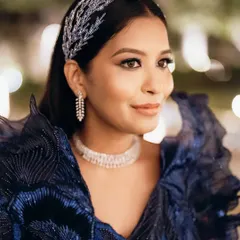 For a cocktail or sangeet night, we can dial up the drama. This look features sultry, smoky eyes with a touch of shimmer, balanced with glowing skin and a neutral lip. It’s a classic after-dark look, designed to be captivating and last through a night of celebration.