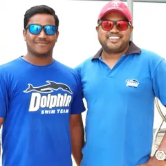 A picture with my fellow coach, Madhu sir. We work together as a team to provide the most complete coaching for our swimmers.