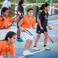 The journey to tennis excellence starts with fun. Our junior program uses engaging group drills and softer balls to build a strong foundation in a positive and encouraging environment, making sure every child develops a love for the game.
