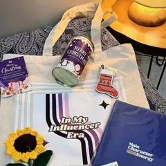 The contents of the collaboration hamper, including the custom tote bag and other branded goodies.