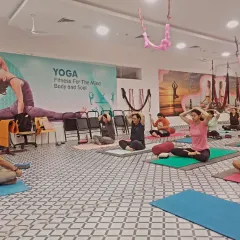 Leading a pranayama session in the studio. Conscious breathing is the anchor of our practice, helping to bridge the gap between the physical body and the subtle mind.