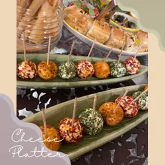 For a more formal presentation, we offer our assorted cream cheese balls on skewers. This makes them an elegant and mess-free addition to any event, from baby showers to corporate functions.