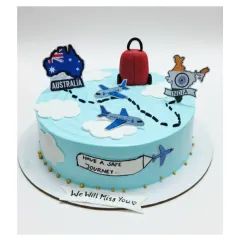 A farewell cake for someone embarking on a journey from India to Australia. This fresh strawberry cake is decorated with a travel theme, complete with airplanes and maps.