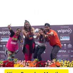 A proud moment on stage at the Wipro Bengaluru Marathon. We love collaborating with major brands to make their corporate fitness events a massive success.