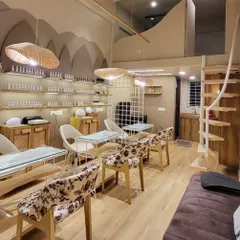 A full view of the studio vibe. I wanted to create a space that feels both luxurious and comfortable for my clients.