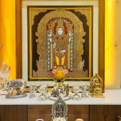 Our Lord Venkateshwara Swamy painting transforms this client's pooja room into a divine sanctuary. The artwork, with its heavy gold work, becomes the centerpiece of their sacred space.