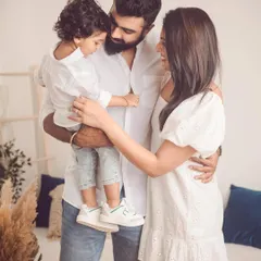 A candid moment of love and laughter. Our lifestyle studio sessions are designed to capture the genuine interactions that define your family.