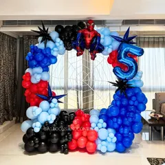 A full view of the Spider-Man balloon installation. The design creates a perfect photo opportunity for the birthday boy and his friends.