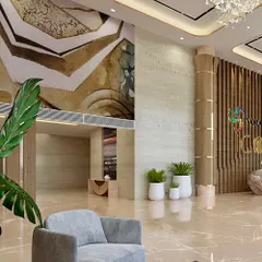 A glimpse into the lobby of Voraskyline Icon, our latest residential project in Kandivali, Mumbai. The design uses a mix of natural stone, wood paneling, and statement art to create a grand and welcoming entrance for residents.