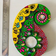 This paisley-shaped candle holder is hand-painted with bright, festive colors and embellished with my custom art cabochons. It's about 6 inches long, perfect for a side table.