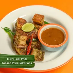 These are my Curry Leaf Podi Tossed Pork Belly Pops. Crispy on the outside and tender on the inside, these flavourful bites are a crowd favourite.