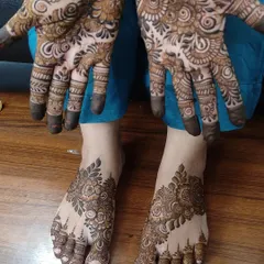 Another angle of the matching hand and feet design, showing the intricate details on both.