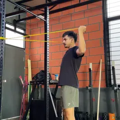 This is one of the rehab exercises I used for my shoulder: banded external rotations. Isolation work like this is crucial for fixing strength imbalances and ensuring training longevity.