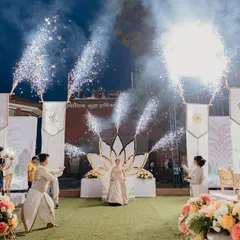 This bride's entry was pure magic. We used a lotus-shaped stage, elegant banners, and synchronized cold pyros to create a divine and ethereal walk down the aisle.