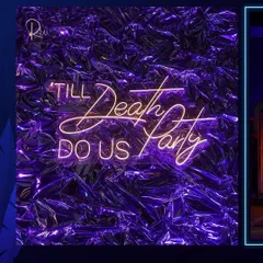 "Till Death Do Us Party." A custom neon sign against a metallic, textured backdrop, perfect for a modern and edgy photo booth.