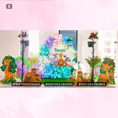 This colorful jungle theme brings together a variety of beloved animals for a fun and vibrant first birthday celebration. The setup includes character cutouts, a custom backdrop, and a mix of pastel and bright balloons.