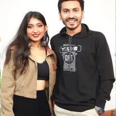 A photo with the host after recording a podcast. I had a great time sharing my story and talking about my journey in the music industry.