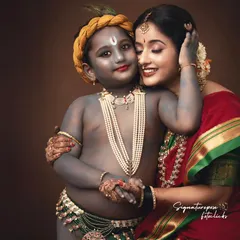 The bond between a mother and child is divine. In this studio portrait, part of my popular Yashoda and Krishna series, I focused on capturing the tender, loving embrace between mother and son. The session includes professional makeup, costumes, and body paint to create an authentic, painting-like feel.