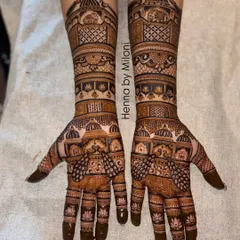 A full bridal mehendi design for both hands, celebrating the spirit of Mumbai. This piece features iconic architectural elements and traditional motifs, creating a symmetrical and grand statement.