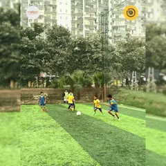 Players battling for possession during a competitive match. Our training focuses on building the strength and awareness needed for these moments.