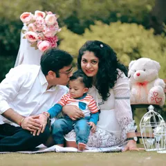 A lovely family picnic setup for a one year old's photoshoot. I can arrange simple props like a teddy bear and blanket to create a sweet, styled scene for your outdoor session.