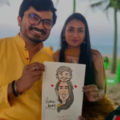 A lovely couple captured at a beachside event. The warm smiles and relaxed setting made for a truly joyful caricature.