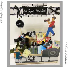A perfect gift for the shutterbug in your life. This photography-themed hamper is creatively designed with camera and film strip motifs and filled with treats for a picture-perfect celebration.