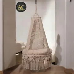 A simple and elegant single seater swing in a natural off-white color. It’s perfect for a quiet hallway or a reading nook, helping you refresh your childhood memories of swinging.