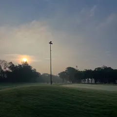 An early morning start, with mist covering the greens. This is a magical time to play, requiring focus and a deep appreciation for the quiet moments in golf.