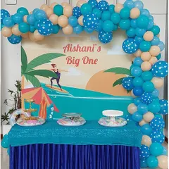 A themed dessert table setup for a child's first birthday party. We provided our popular Chaat Counter for this fun, beach-themed celebration.