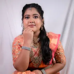 Effortless elegance and timeless grace. A beautiful reception look with a pink and gold saree and soft, glowing makeup.