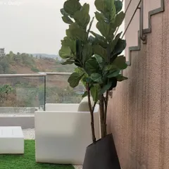 The view from the "Agra Fort" bedroom terrace, looking out over the spiritual valley. We used modern, minimalist furniture to keep the focus on the serene landscape.