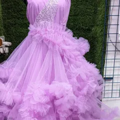 Last-minute party plans? My rental service has you covered. This lavender ruffle gown with a beaded sash is just a call away for your next birthday or wedding event.