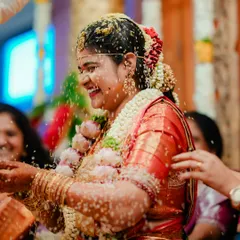 The Talambralu ritual in a Telugu wedding, a moment of pure joy and blessings as the bride is showered with rice. Capturing the energy of these sacred traditions is my specialty.