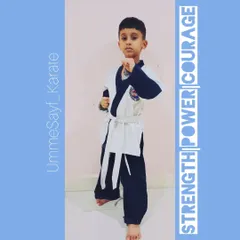 Don't let the cute face fool you. This young karateka has strength, power, and courage beyond his years. This is the confidence that karate builds.