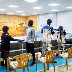 A mixed group of campers practicing with both air rifles and air pistols. My camp curriculum allows students to try different disciplines to find what they enjoy most.
