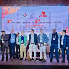 A group photo with esteemed colleagues on stage at the 2nd FUE Global Congress & 3rd FUE Asia World Congress. These events are vital for sharing knowledge and advancing the field of hair restoration.