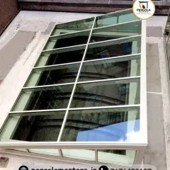 A pitched glass skylight installed on a rooftop. This functional design is built to maximize light intake while ensuring a weatherproof seal, perfect for illuminating stairwells or interior rooms from above.
