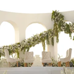 For this modern beach wedding at the Taj Holiday Village in Goa, I designed a clean, architectural mandap with an asymmetrical floral arrangement, letting the beauty of the ocean view complete the picture.