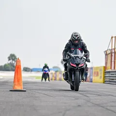 Focus is everything. A student practices drills at Kari Motor Speedway, learning to block out distractions and concentrate on the next marker. This is a core skill we teach.