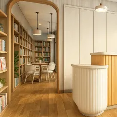 An arched timber doorway frames a view into a cozy reading area, complete with built-in bookshelves and comfortable seating. This design creates a sense of discovery and provides a quieter, more intimate zone within the larger library.