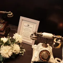 A modern twist on a classic guest book. This audio guest book station allowed guests to leave recorded messages using vintage telephones, creating a unique and lasting keepsake. It's a wonderful interactive feature for any milestone event.