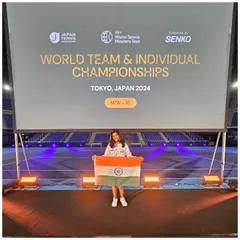 Representing the nation is the ultimate dream for any athlete. Here is our tennis player, Meenakshi Srinivasan, holding the Indian flag with pride at the World Team & Individual Championships in Tokyo, Japan.
