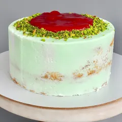 My Raspberry Pistachio Naked Cake is for those who want less fluff and more indulgence. I pair a soft pistachio sponge with a fresh raspberry compote and a pistachio white chocolate ganache. It's all about premium ingredients and balanced flavours.
