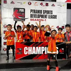 Champions! Our U7 team proudly displays their trophy after winning the Pyramid Sports Development League (PSDL). A fantastic achievement for our little Lions and their coach.