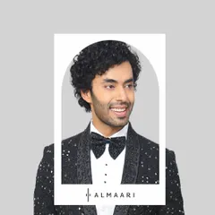 A happy client ready for his big event in one of our sparkling tuxedo jackets. The sequined bow tie completes this fun and formal look, perfect for a reception or New Year's Eve party.